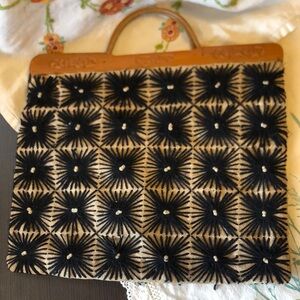 Vintage handmade handbag with carved wooden handles